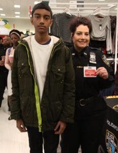 A man and woman standing next to each other.