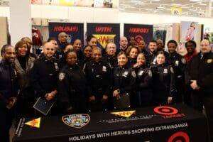 A group of people in police uniforms posing for a picture.